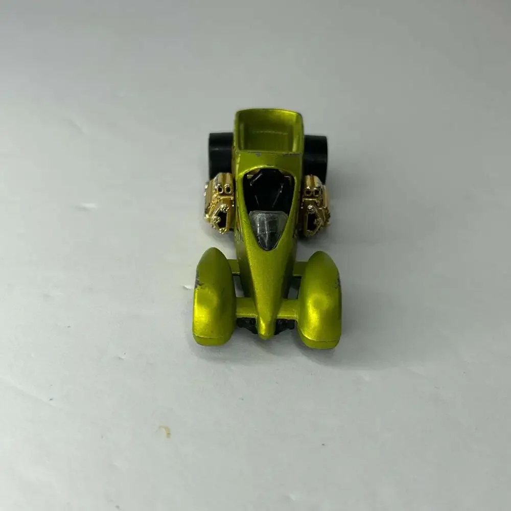 Hot Wheels 1999 Screamin' Hauler Green and Gold Diecast Car